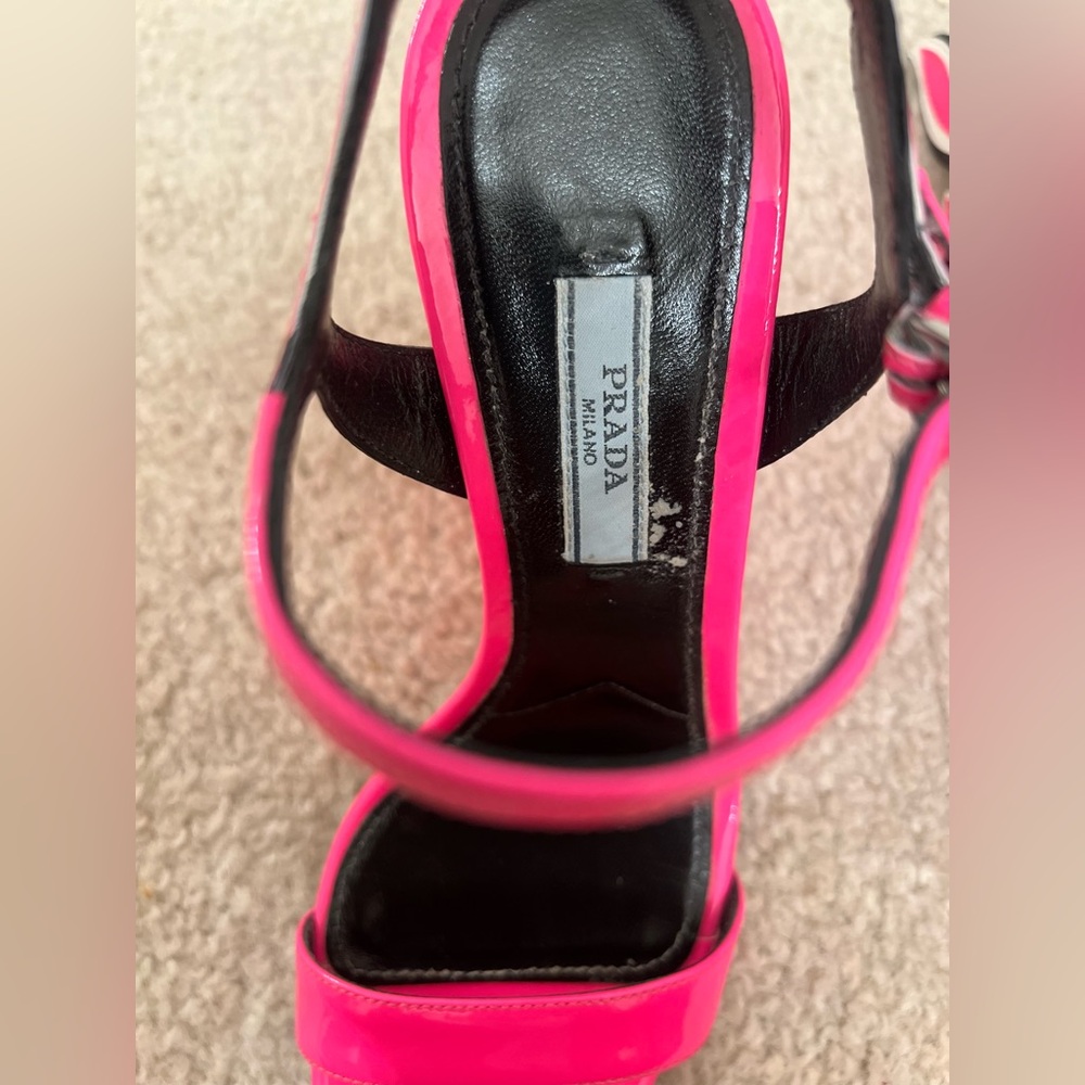 Neon pink fire heels .